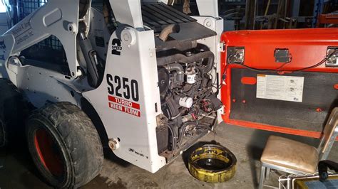 bobcat skid steer oil change|bobcat s250 oil filter.